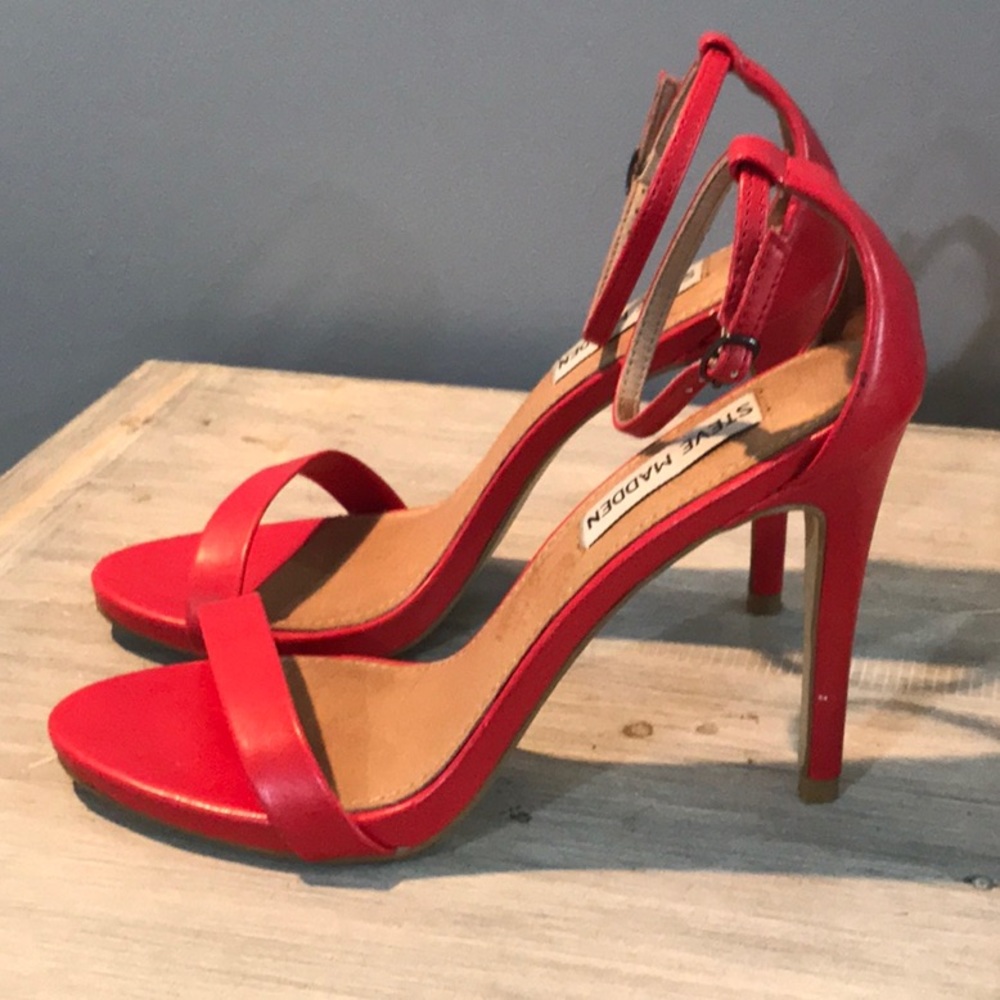 Red leather strap closure sandal.